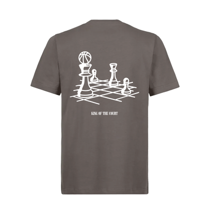 Grey t shirt with chess pieces. One piece is a king and it has a basketball as a crown. The text reads "King of the court". 